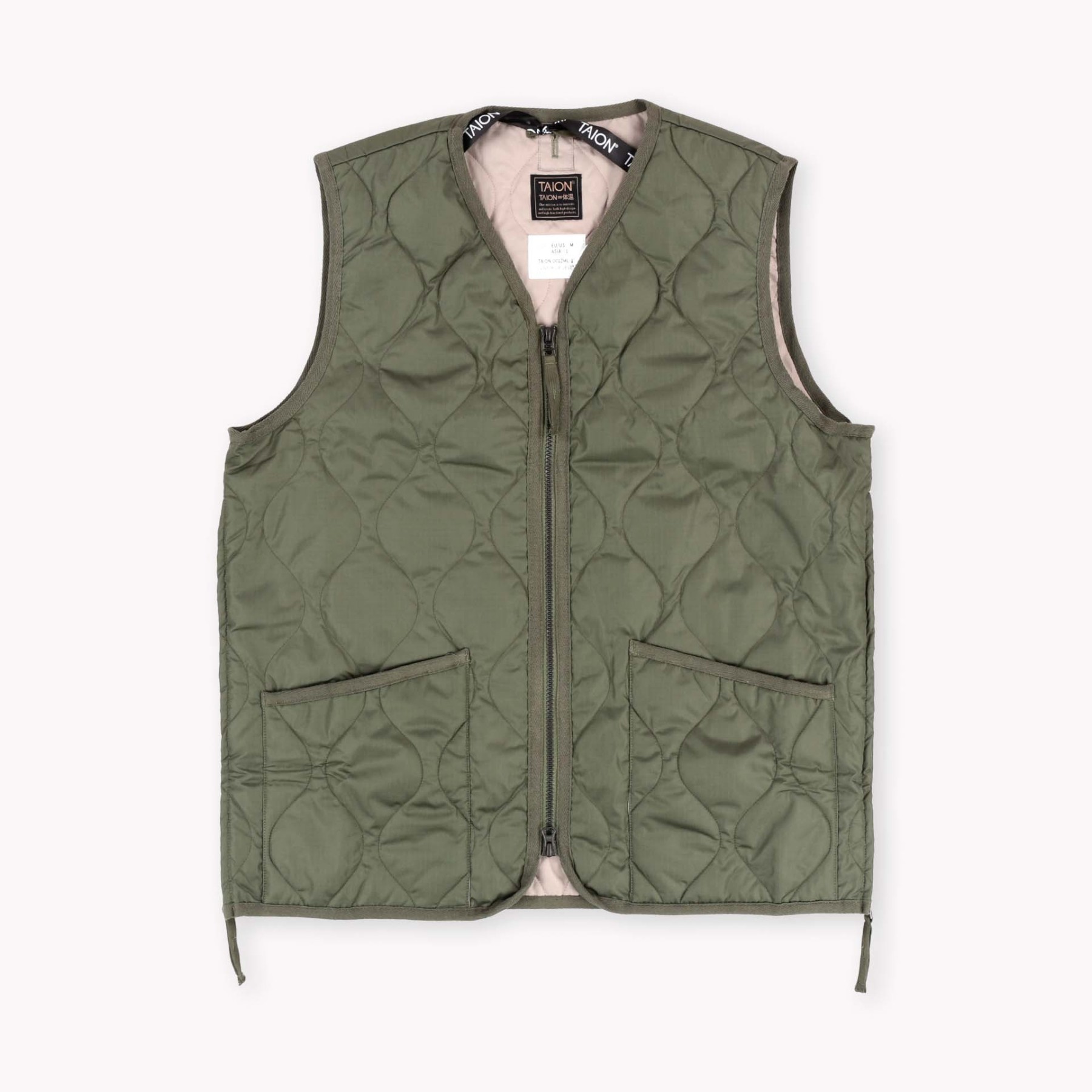 green sleeveless vest